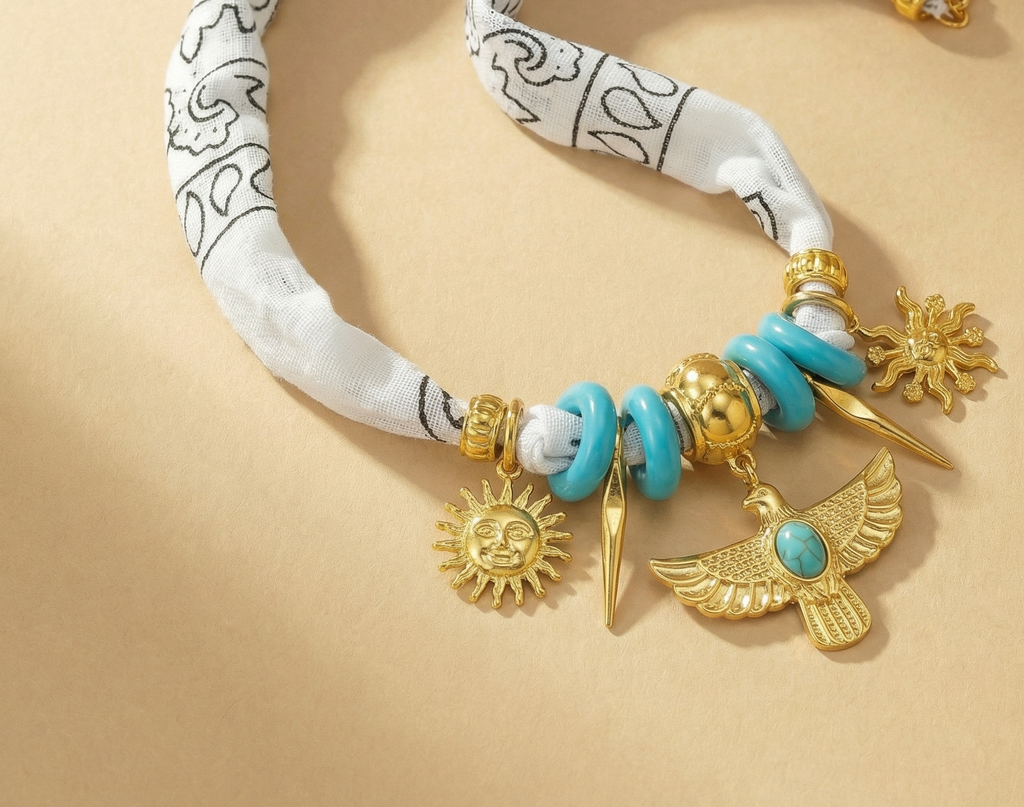 White scarf necklace with native inspired gold charms
