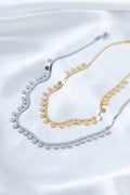 Steel flat chain with circle dot details in gold and silver