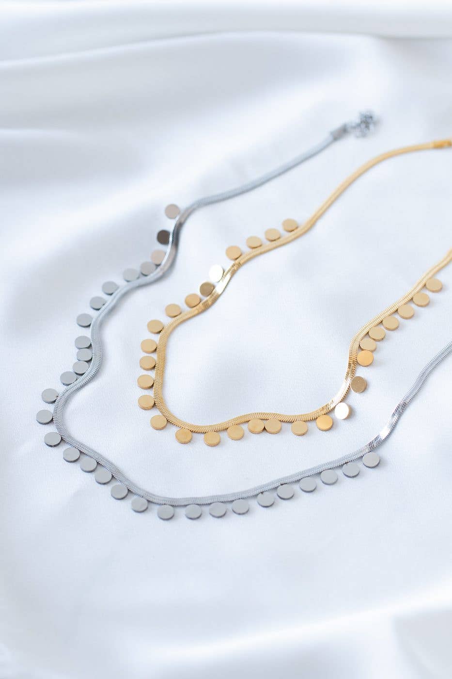 Steel flat chain with circle dot details in gold and silver