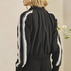 Lace trimmed nylon jacket